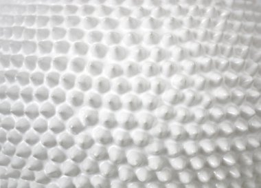 White texture with spikes. Surface with sharp cones of white color.