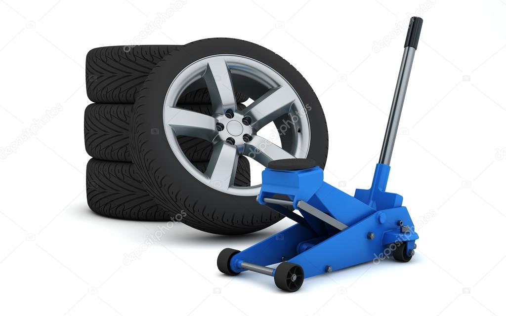Car jack and wheels — Stock Photo © rottenman 40273477