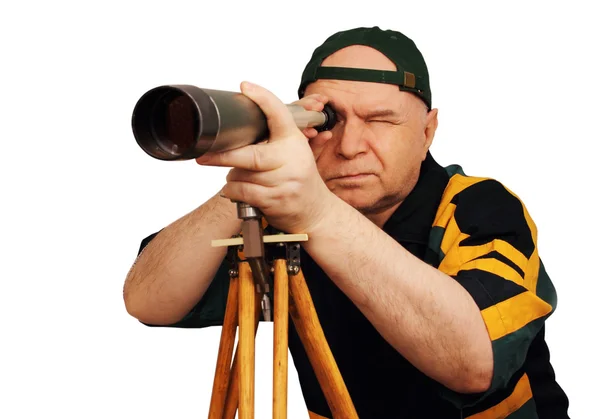 A man with a telescope in hand — Stock Photo, Image