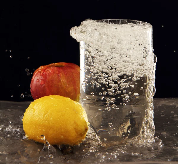 Water and fruit. — Stock Photo, Image