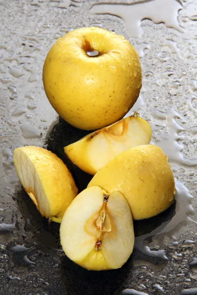 Apples on a wet glass. — Stock Photo, Image