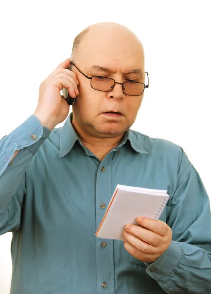 Muž s notebook a telefon. — Stock fotografie