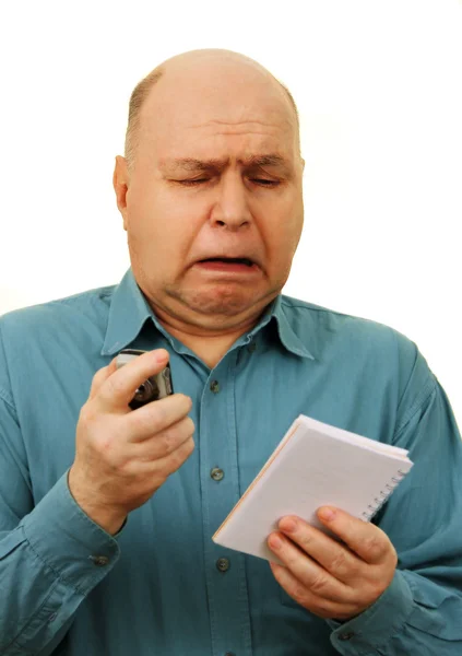 Homem com notebook e telefone . — Fotografia de Stock