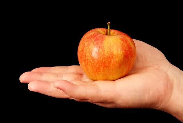 Rijpe appel in haar hand. — Stockfoto