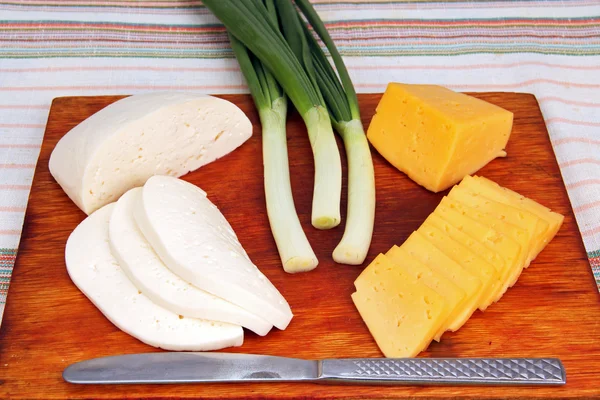 Cheese and green onions. — Stock Photo, Image