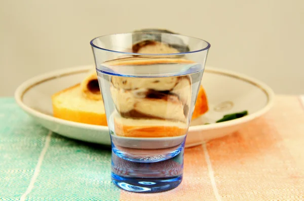 A shot of vodka with a snack. — Stock Photo, Image