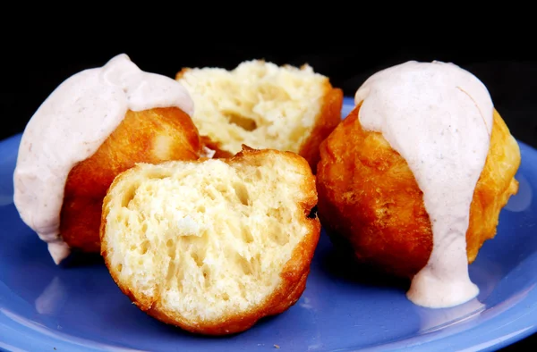 Homemade donuts with white cream. — Stock Photo, Image