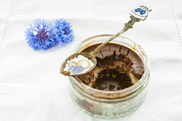 Chocolate dessert with cornflowers — Stock Photo, Image