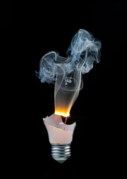 Une ampoule brûle Photo De Stock