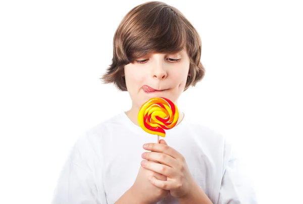 Niño con caramelo —  Fotos de Stock