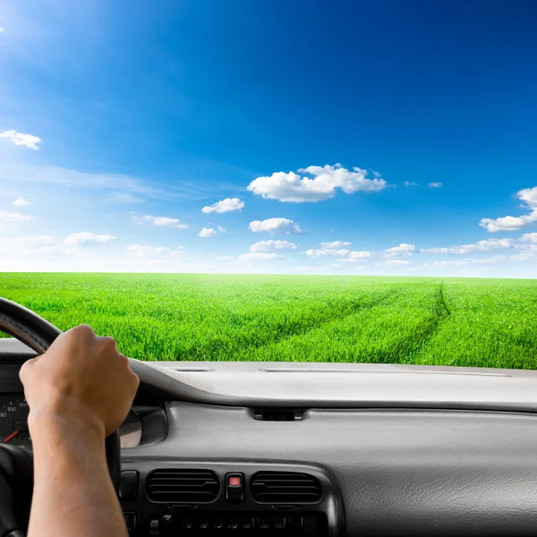 Steering wheel of a car and sky background — Stock Photo, Image