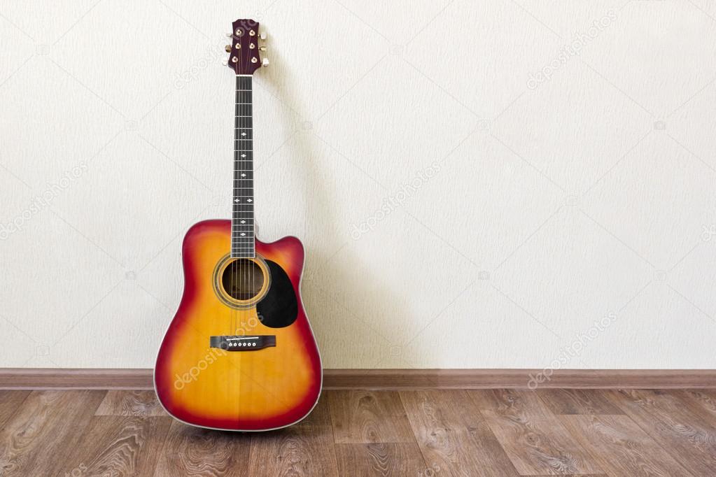 Guitar in blank empty room background