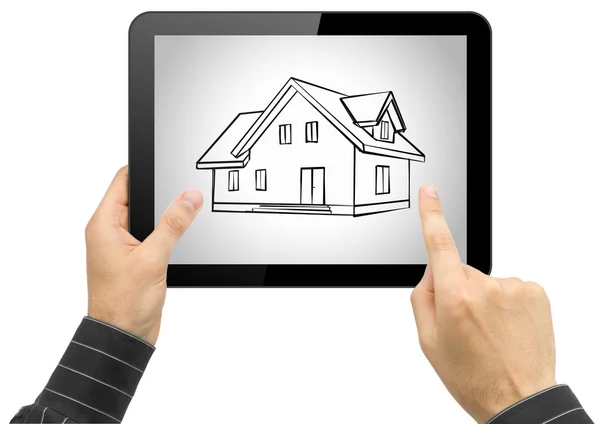 Black tablet pc with house sketch project in hands — Stock Photo, Image