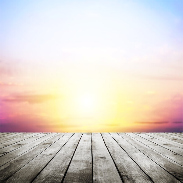 Blue sky with clouds and wood planks floor background