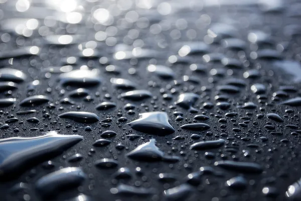 Gotas de agua en superficie metálica — Foto de Stock