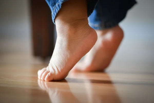 Infant's Precious Feet On Tippy Toes - Innocence Concept Royalty Free Stock Images