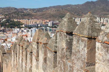 Malaga in Andalusia, Spain. Alcazaba castle walls on Gibralfaro mountain. clipart