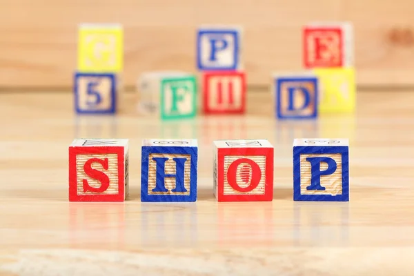 Wooden blocks with letters — Stock Photo, Image