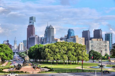 City skyline with Benjamin Franklin parkway. clipart
