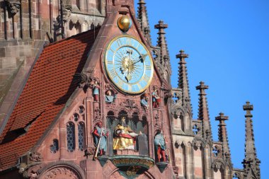 Frauenkirche in Nuremberg city, Germany. Frauenkirche (Church of Our Lady). Mannleinlaufen mechanical clock. clipart