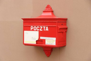 WROCLAW, POLAND - SEPTEMBER 2, 2018: Post box of Poczta Polska in a street of Wroclaw Old Town. Poczta Polska is the national public postal service operator in Poland.