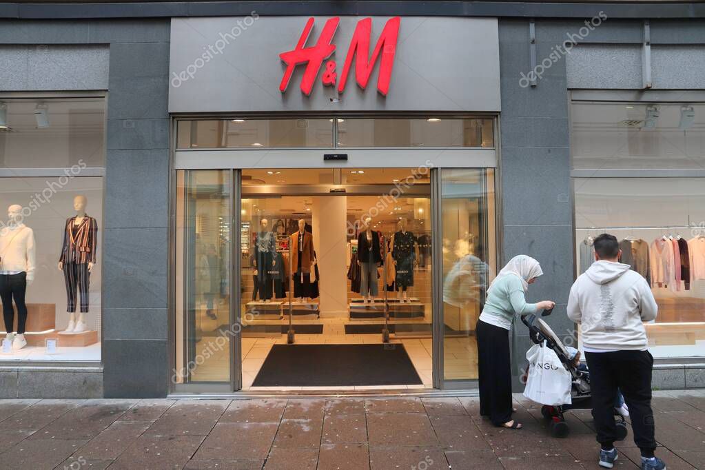 GOTHENBURG, SWEDEN - AUGUST 27, 2018: People visit H&M fashion store in Gothenburg, Sweden. H&M is a Swedish brand known internationally for its casual collection.