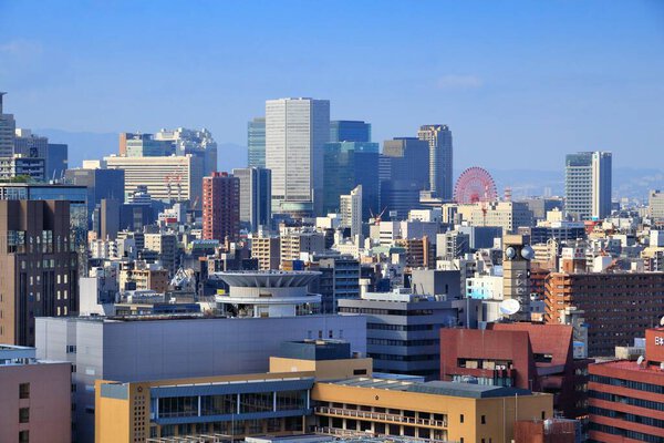 OSAKA, JAPAN - NOVEMBER 22, 2016: Urban skyline of Umeda, Osaka city, Japan. Osaka belongs to 2nd largest metropolitan area of Japan (19.3 million people).