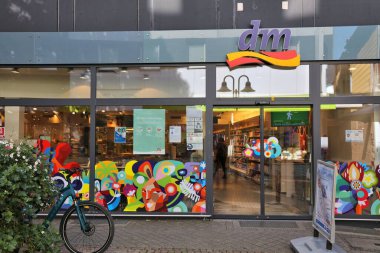 BOCHUM, GERMANY - SEPTEMBER 17, 2020: DM Drogerie Markt pharmacy and beauty store in Wattenscheid, Bochum. Total retail sales in Germany amounted to 450 billion EUR in 2013. clipart