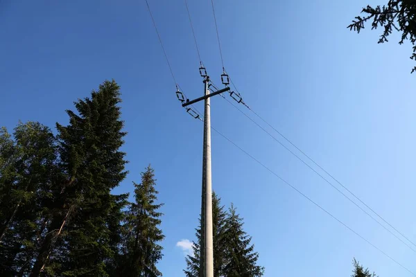Electric grid near Wisla, Poland. Utility pole in Poland.