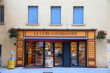 ORANGE, FRANCE - SEPTEMBER 30, 2021: La Cure Gourmande in Orange, France. La Cure Gourmande is a chain of artisanal cookies and chocolates made in Occitania region of France.