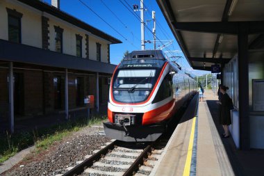 CARINTHIA, AUSTRIA - AUGUST 11, 2022: Bombardier Talent passenger train of Austrian Federal Railways OBB at Foderlach railway station in Carinthia, Austria.