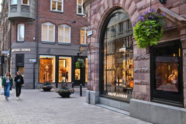 STOCKHOLM, SWEDEN - AUGUST 22, 2018: Ralph Lauren and Michael Kors fashion store in Stockholm, Sweden. Ralph Lauren is an American apparel company founded in 1967.