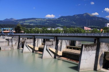 Austria hydroelectricity generation. Water power plant on river Salzach in Hallein. clipart