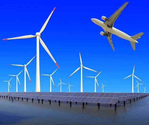 Aircraft is flying in eco power of wind turbines and solar panel — Stock Photo, Image