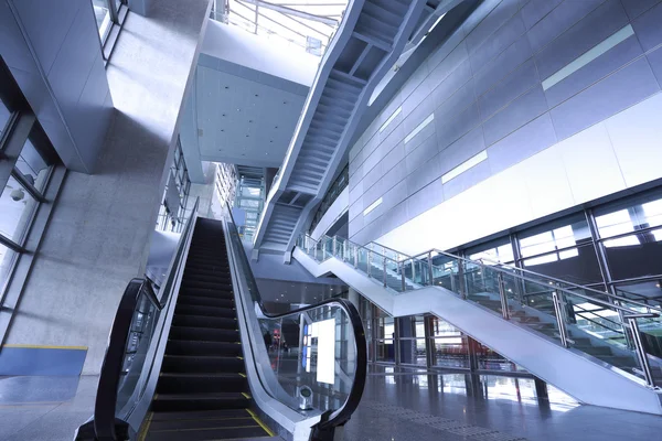 Modern architecture steps of moving business escalator and stair — Stock Photo, Image
