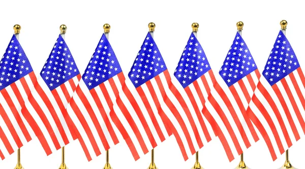 Flags of US hanging on the gold flagpole — Stock Photo, Image