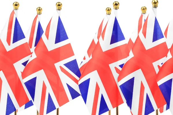 Bandeiras do Reino Unido penduradas na bandeira dourada — Fotografia de Stock