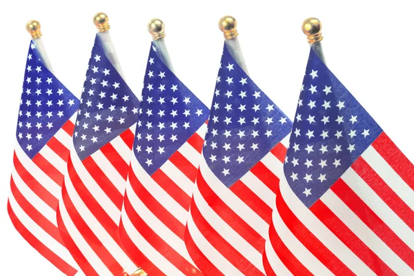 United States of America flags hanging on the gold flagpole — Stock Photo, Image