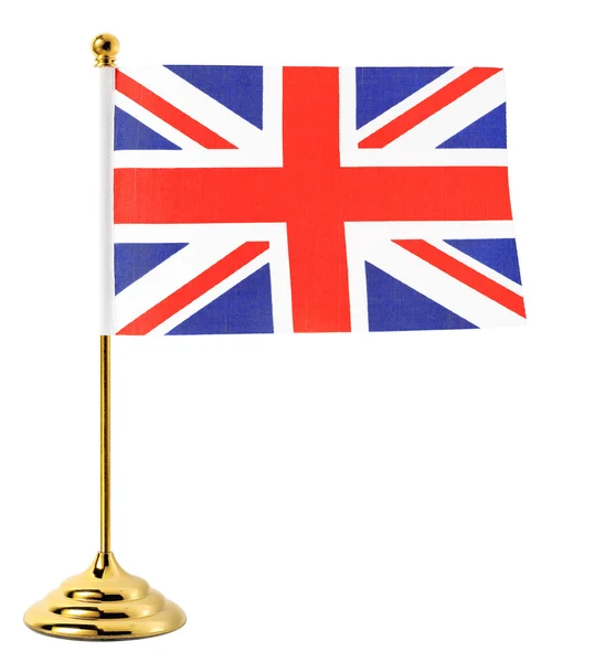 Золотой флагшток, висящий на флаге Великобритании — стоковое фото