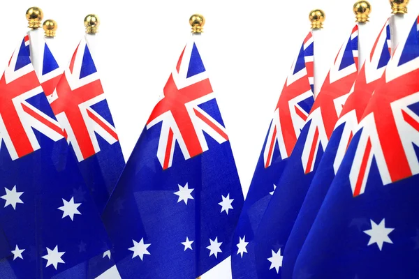 Bandeiras da Austrália penduradas na bandeira dourada — Fotografia de Stock