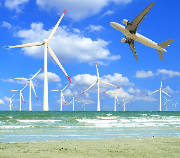 Aircraft is flying in eco power of wind turbines