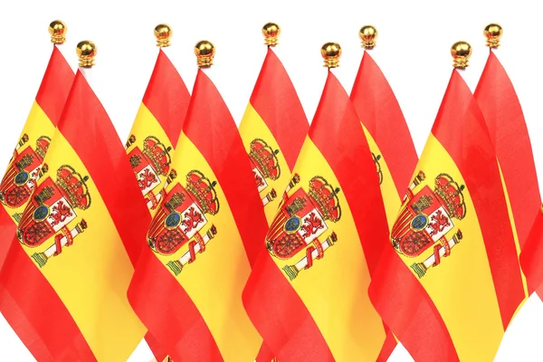 Bandeiras da Espanha penduradas na bandeira dourada — Fotografia de Stock