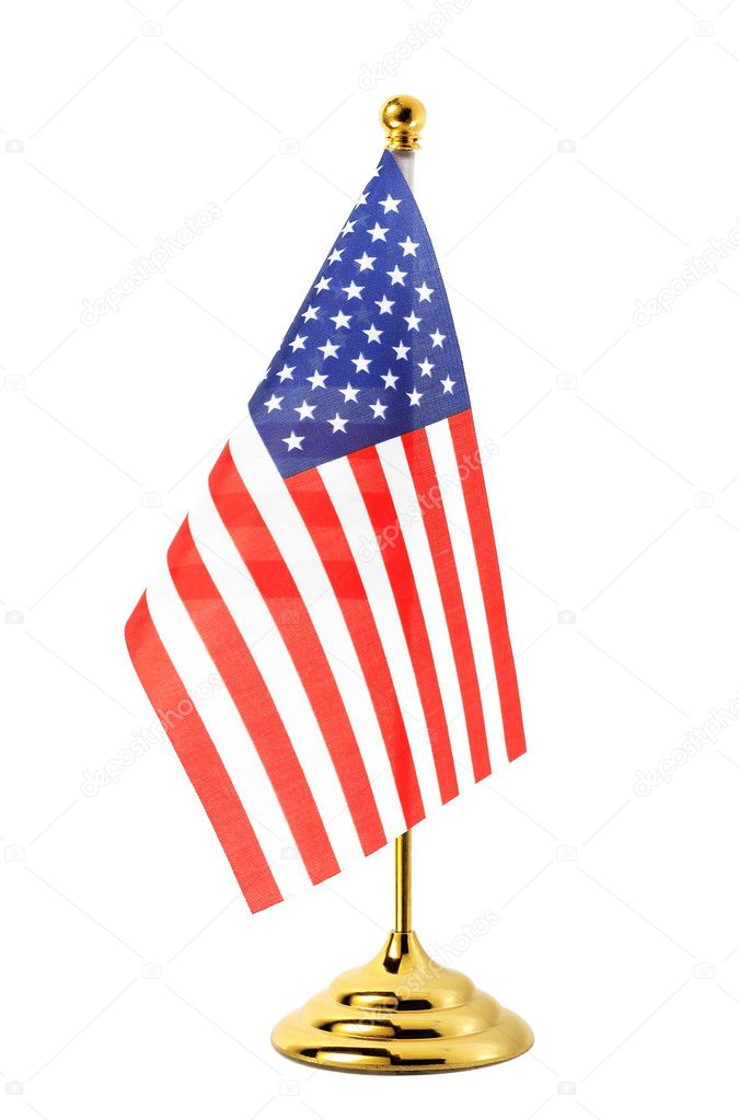 Flag of US hanging on the gold flagpole