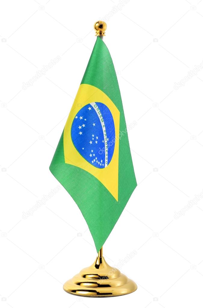 Flag of Brazil hanging on the gold flagpole