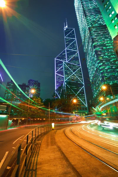 Road light trails on streetscape buildings backgrounds in HongKo — Stock Photo, Image
