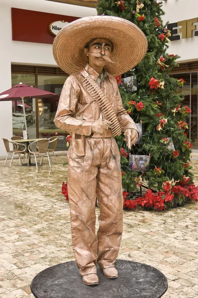 Mexican troll wearing sombrero and guerrilla costume — Stock Photo, Image