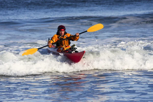 Kayak surfer in action — Stock Photo, Image