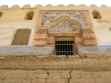 Enameled tile-work around the old entrance to the mosque of  Abu el-Haggag, Great Court of Ramses II, Luxor Temple, Egypt