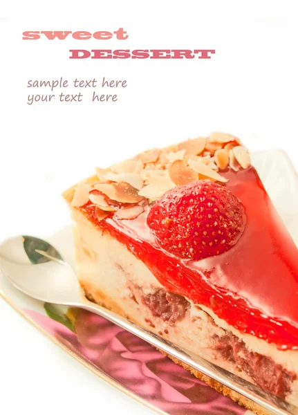 Cheesecake with strawberry on sauser with spoon isolated on whi — Stock Photo, Image