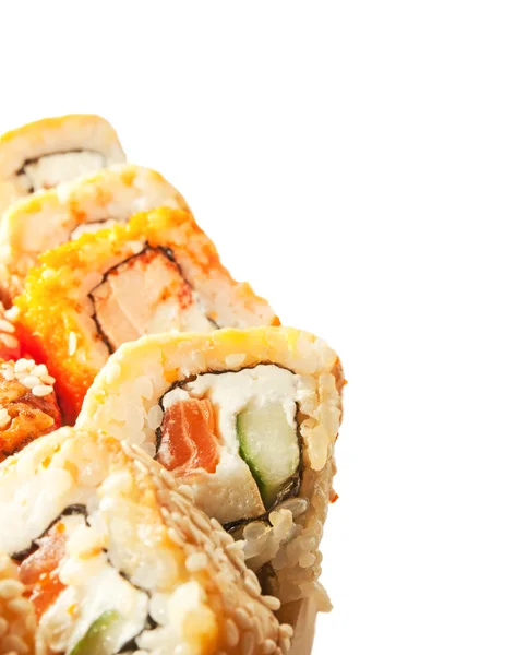 Rolos de sushi em faixa isolada em branco — Fotografia de Stock